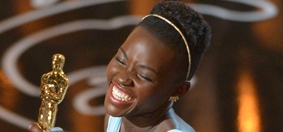 Lupita Nyong’o accepts the award for best actress in a supporting role for "12 Years a Slave" during the Oscars at the Dolby Theatre on Sunday, March 2, 2014, in Los Angeles.  (Photo by John Shearer/Invision/AP)