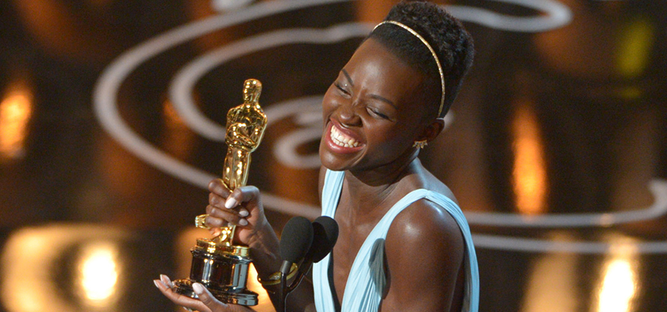 Lupita Nyong’o accepts the award for best actress in a supporting role for "12 Years a Slave" during the Oscars at the Dolby Theatre on Sunday, March 2, 2014, in Los Angeles.  (Photo by John Shearer/Invision/AP)